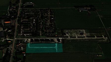 Een luchtfoto van Zwaagdijk-Oost met een aanduiding (rechthoek) waar de wijk wordt gebouwd.